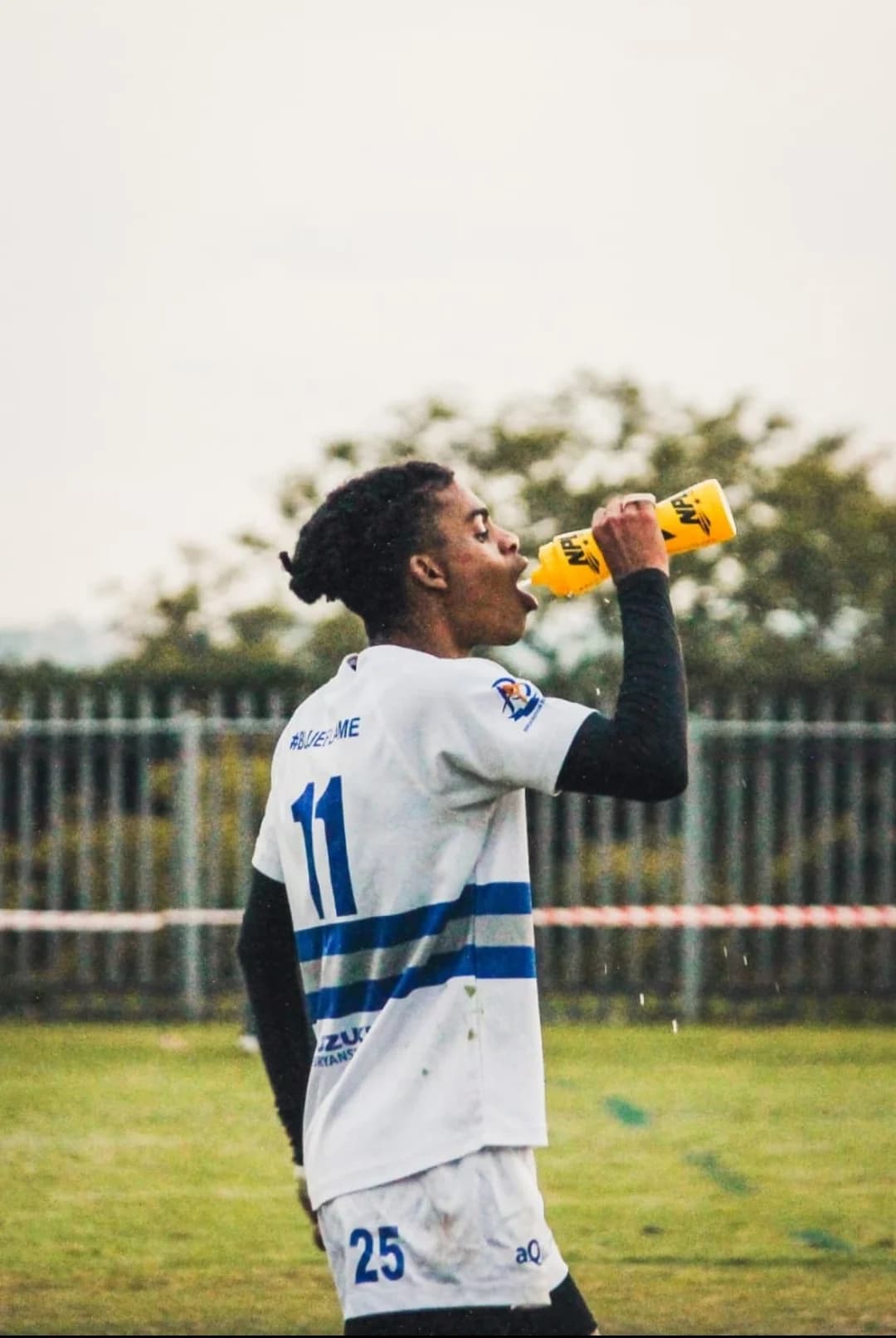 Faith taking a break during a rugby match